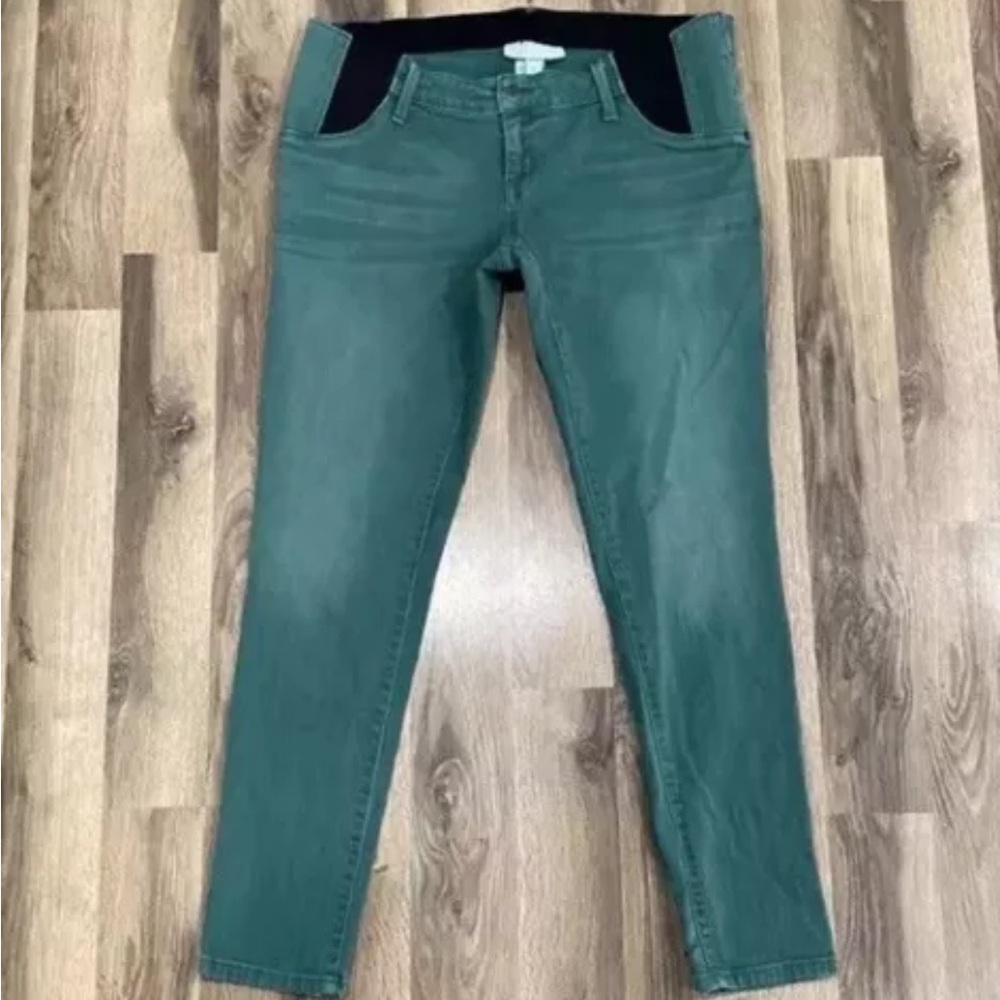 Maternity jeans with waistband that fits without constricting growing belly.